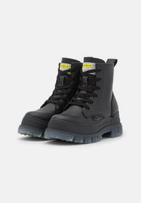 Buffalo ASPHA - Botas de tornozelo com plataforma - black/transparent