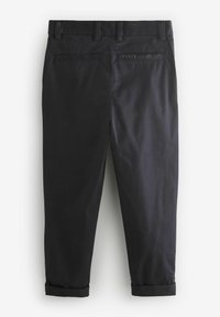 Pantalon en coton noir, coupe droite, avec des revers roulés, deux poches arrière et un petit logo sur la taille.