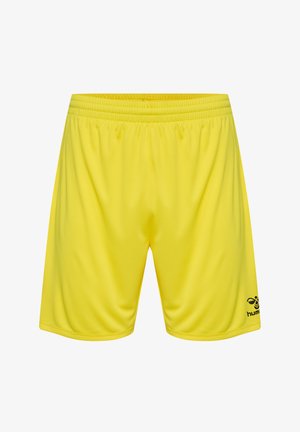 Shorts de sport jaunes avec une taille élastique, texture lisse et un logo noir imprimé sur le bas à droite.