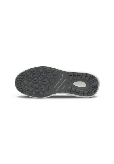 Shoe sole with a textured gray rubber surface, featuring a hexagonal pattern for grip and a contrasting lighter edge for durability.