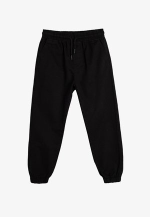 Pantalones de chándal negros con cintura elástica, cordón ajustable, bolsillos laterales y puños ajustados en los tobillos. Textura de tela suave.