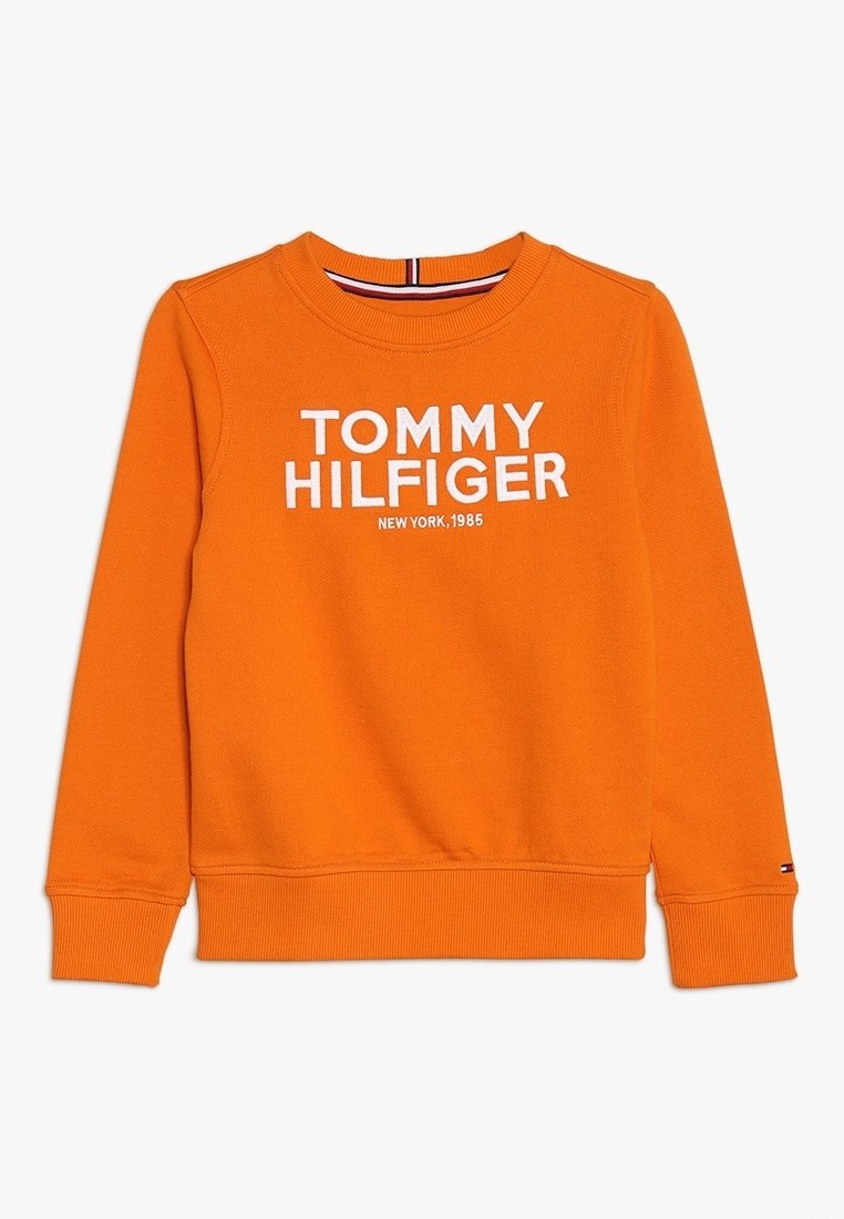 Oranžová mikina s dlouhým rukávem a kulatým výstřihem s bílým potiskem "Tommy Hilfiger New York, 1985" na přední straně, žebrované manžety a lem.