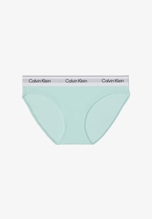 Lichtblauwe slipjes voor dames met een witte tailleband met herhaald zwart "Calvin Klein" logo.