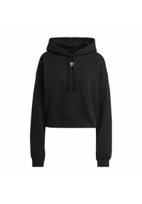 Svart kort tröja med snörning i huven, ribbade ärmslut och nederkant. Har en liten vit logotyp på bröstet. Mjuk tygtextur.