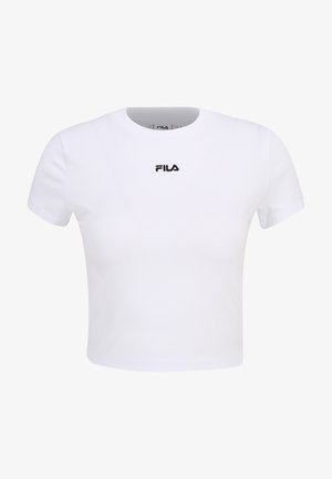 Valkoinen lyhythihainen crop-top-paita, joka on valmistettu puuvillasta, pyöreällä kaula-aukolla ja lyhyillä hihoilla, musta FILA-logo keskellä rintaa.