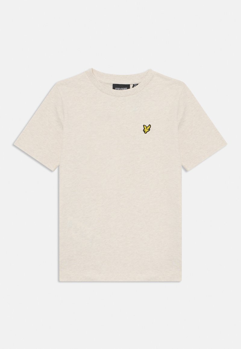 Camiseta de manga corta beige hecha de tejido suave, con un pequeño bordado de mariposa amarilla en la parte izquierda del pecho.