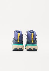 Navy and purple hiking boots with a textured upper, yellow pull tab, green sole, and reflective laces; designed for outdoor durability and support.