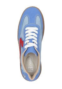 Light blue sneaker with red accents, white laces, and light brown sole. Features soft material and a rounded toe design.