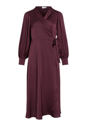 Burgundy wrap dress with long puff sleeves, tied waist, and a flowing silhouette. Made from smooth fabric, featuring a v-neckline and soft drape.