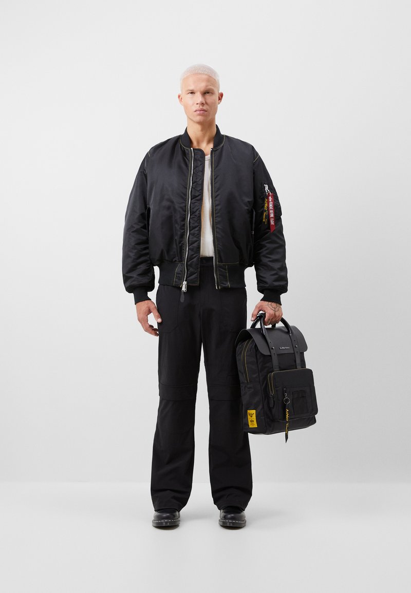 Alpha Industries DR MARTENS X ALPHA UNISEX - Bomber Jacket - black 