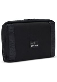 Black fabric wallet with textured surface, zip closure, and embossed branding. Compact rectangular shape with reinforced edges.