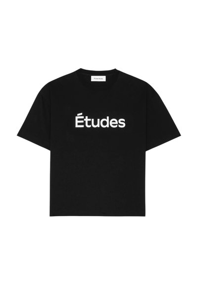 T-shirt noir à manches courtes en coton, avec le texte blanc "Études" sur le devant. Encolure ronde, coupe décontractée, texture douce.