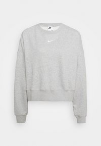 Grå kort sweatshirt i mjukt material. Har rund halsringning och långa ärmar. Vit Nike-logotyp på bröstet; ribbade muddar och nederkant.