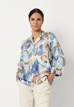 Lightweight blouse with a floral leaf pattern in blue, beige, and brown tones. Features a button-down front and three-quarter sleeves.