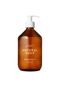 Flacone a pompa di ambra marrone contenente sapone naturale al pompelmo, con testo bianco sulla parte anteriore e un tappo a pompa bianco con scanalature per il dosaggio.