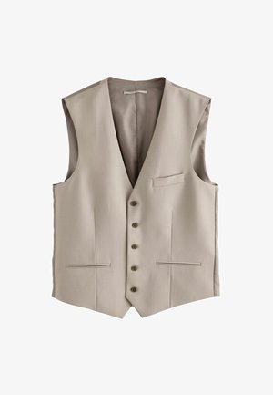 Beige ilman hihnoja liivi, jossa on syvä V-kaula-aukko, kuusi nappia, kaksi etutaskua ja sileä vuori. Muotoiltu hienovaraisilla ompeluyksityiskohdilla.