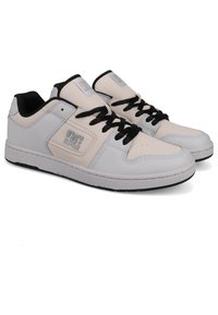 White and grey leather sneakers with black laces, low-top design, visible logo on the side, and a textured finish on the upper.