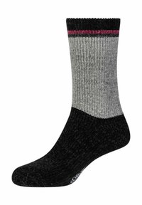 Calze a strisce nere e grigie con una texture a coste. Accenti neri sulla punta e sul tallone. Nella parte superiore presenta una striscia rosa. Il materiale sembra morbido e accogliente.