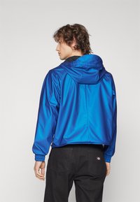 Rains STRING JACKET UNISEX - Vasaras jaka - storm