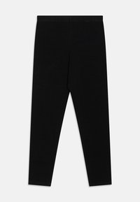 Fekete leggings sima, rugalmas anyagból. Feszes fazonúak, elasztikus derékkal rendelkeznek, és nincsenek látható varrások.