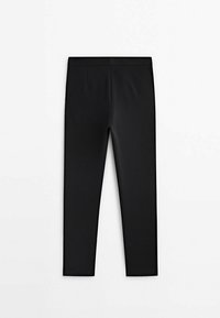 Pantalon noir ajusté, longueur cheville, taille haute, design uni sans poches visibles ni ornements.