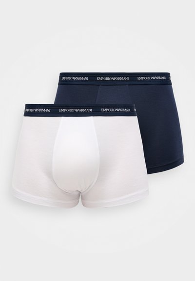 Puuvillasegu bokserid valgetest ja tumesinistest värvidest, millel on elastne vöökoht "Emporio Armani" logoga, sile tekstuur ja sobiv disain.