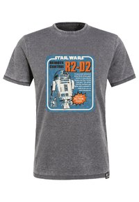 Grå bomulds t-shirt med et blåt grafisk motiv af R2-D2 og teksten "Star Wars Fjernbetjening R2-D2" med en taleboble, der beskriver actionslyde.