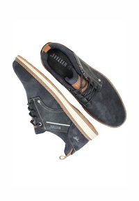 Dark blue sneakers made of textured fabric and suede with a beige rubber sole, featuring tan accents and lace-up design.