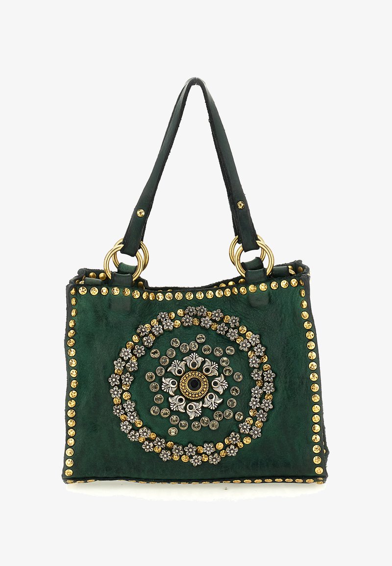 Borsa in pelle verde con due manici, decorata con borchie floreali dorate e argentate disposte in cerchi concentrici e lungo i bordi.