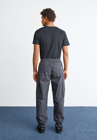 Champion Rochester SURPLUS CUFF PANTS - Cargobukse - black