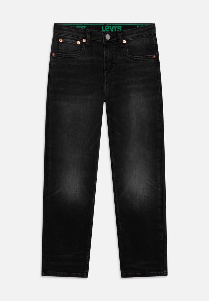 Jean Levi's noir avec cinq poches, fermeture par bouton et fermeture éclair, légère décoloration sur les cuisses, et ceinture verte de marque visible à l'intérieur.