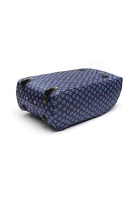 Rolling bag with a dark blue fabric featuring a floral pattern in pink, white, and green. Rounded shape with two black wheels and handles.