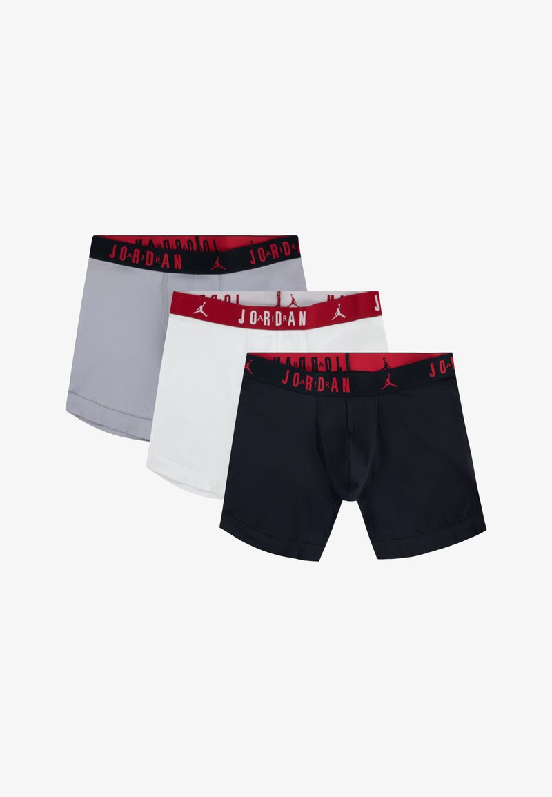 Three pairs of men's boxer briefs in gray, white, and navy, featuring elastic waistbands with red and black Jordan branding.