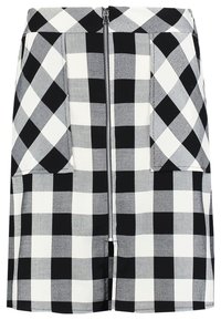 Károvaná sukně v černobílé barvě s předním zipem, strukturovaný design a hladká textura. Doplněná o našité kapsy.