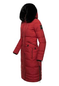 Red, long puffer coat with a black faux fur hood, zippered pockets, and a quilted design. Features a front zipper with snaps for closure.