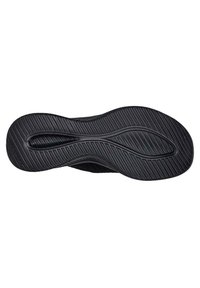 Suela de zapato de goma negra con una superficie texturizada que presenta surcos y crestas curvadas para mayor tracción. Forma plana y redondeada sin marca visible.
