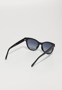 Fossil Lunettes de soleil - black
