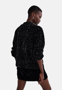 Monoprix À MANCHES LONGUES EN ET SEQUINS - Gilet - noir