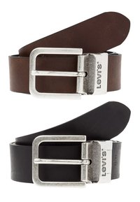 Leather belts in brown and black with silver metal buckles. The buckles feature a rectangular shape and an engraved logo.