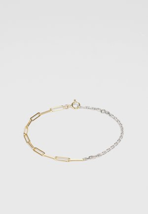 Armband aus Gold- und Silberkette mit verlängerten Gliedern in einem Mischmetall-Design, ausgestattet mit einem Karabinerverschluss und strukturiertem Finish.