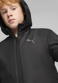 Puma YOUTH - Lengva striukė - black