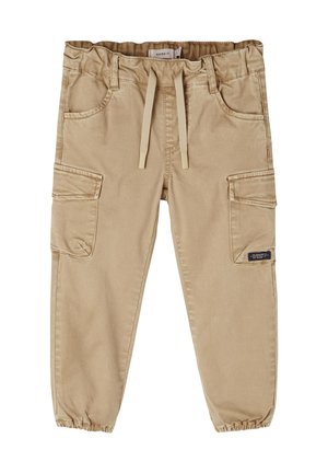 Pantalon cargo beige pour enfants avec taille élastique, cordon de serrage, poches latérales à rabat et poignets élastiques.
