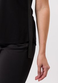 TUZZI MIT GLITZERSTEINEN - Top - schwarz