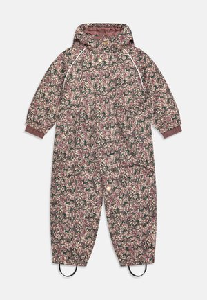 Salopetă de iarnă pentru copii cu model floral în culori roz închis, verde și crem. Dispune de glugă, manșete elastice și curele întărite pentru cizme. Material impermeabil.