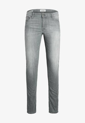 Vaqueros de mezclilla gris descoloridos con un ajuste slim, diseño de cinco bolsillos, sutiles detalles de desgaste y marca bordada en la pretina.