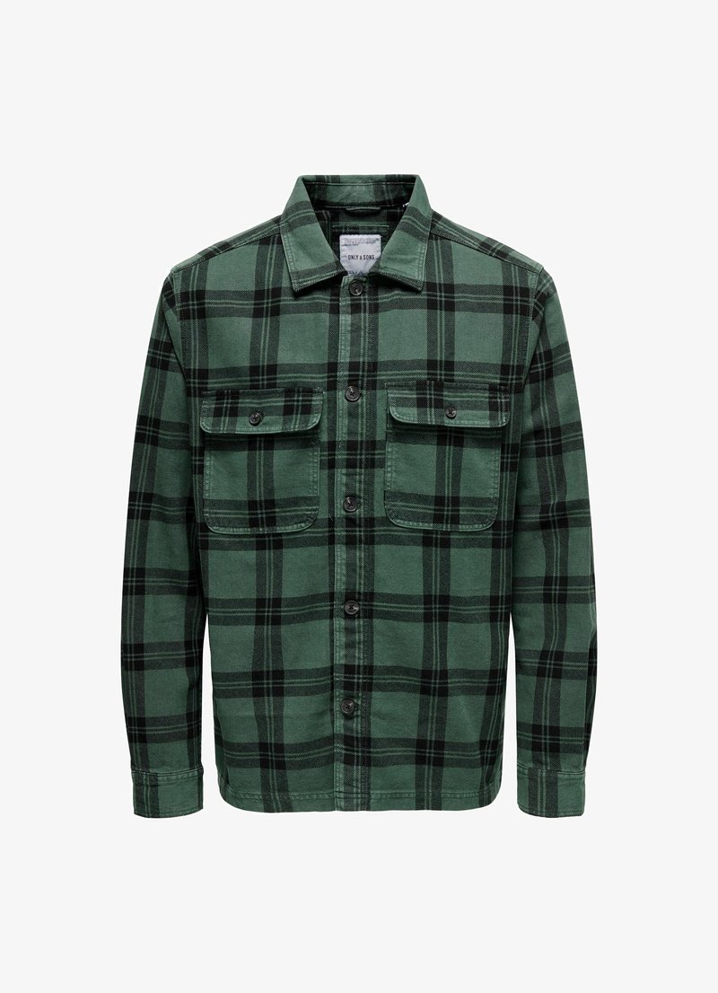 Green and black plaid flannel shirt with a collared neck, button closure, and two front chest pockets. Soft texture, long sleeves.