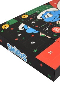 Calendario dell'avvento a tema Puffi in cartone nero, con illustrazioni colorate, porte numerate e accenti di stelle rosse e verdi. Dimensione 35-41.