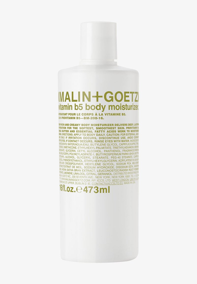 Weißer zylindrischer Behälter mit grünem Logo und Text. Enthält 473 ml Vitamin B5 Körperfeuchtigkeitsspender mit englischer und französischer Beschriftung.