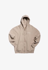 Sudadera con cremallera color beige, fabricada en suave algodón. Cuenta con un bolsillo frontal, cordones y un logotipo bordado "BLKVIS". Puños y dobladillo acanalados.