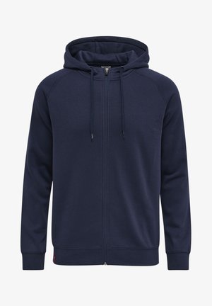 Granatowa bluza z kapturem wykonana z mieszanki bawełny. Posiada pełny zamek z przodu, regulowane sznurki oraz ściągacze przy mankietach i hemie.